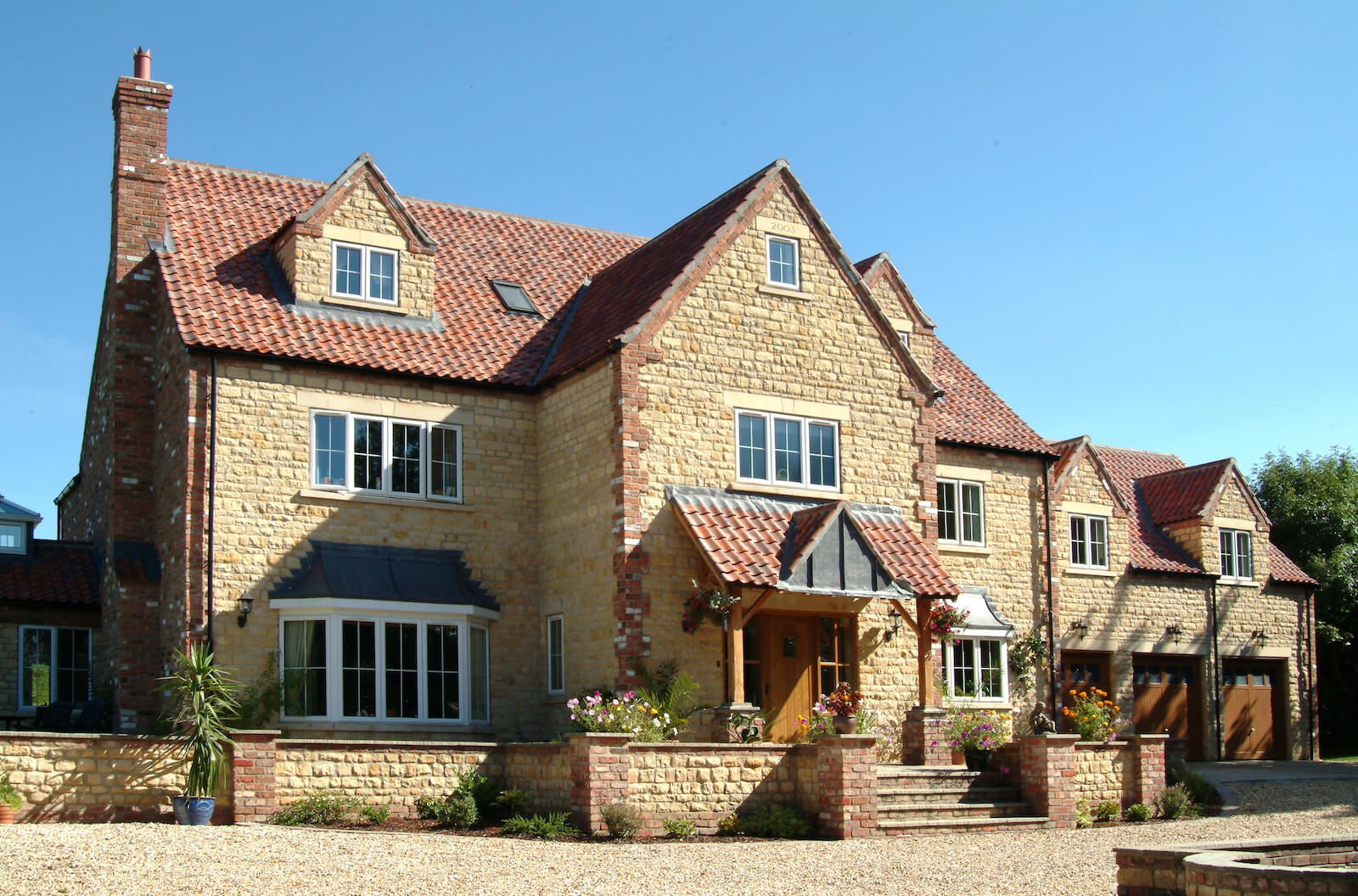 Large house with white Eurologik uPVC windows